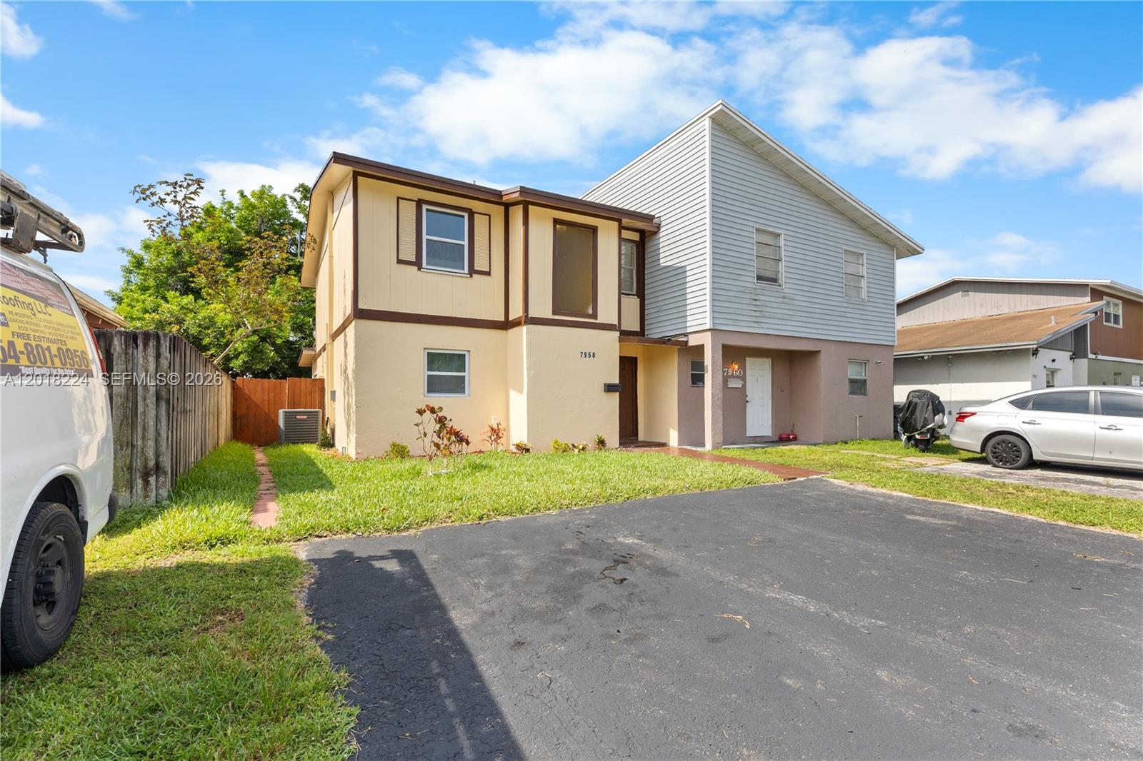 7958 Southwest 6th Street Pompano Beach, FL 33068 - Photo 4 of 57 a view of a house with a yard and sitting area