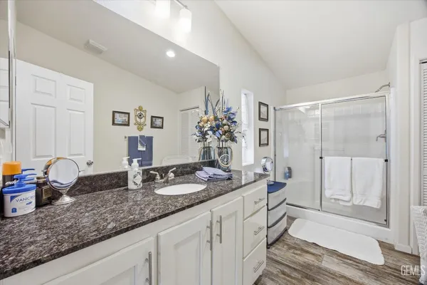 a bathroom with sink and mirror