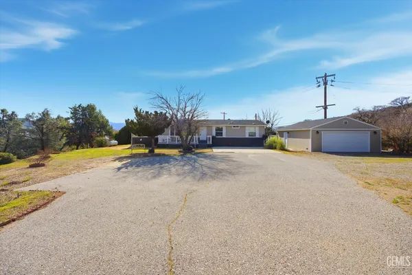 a view of a swimming pool with a slide