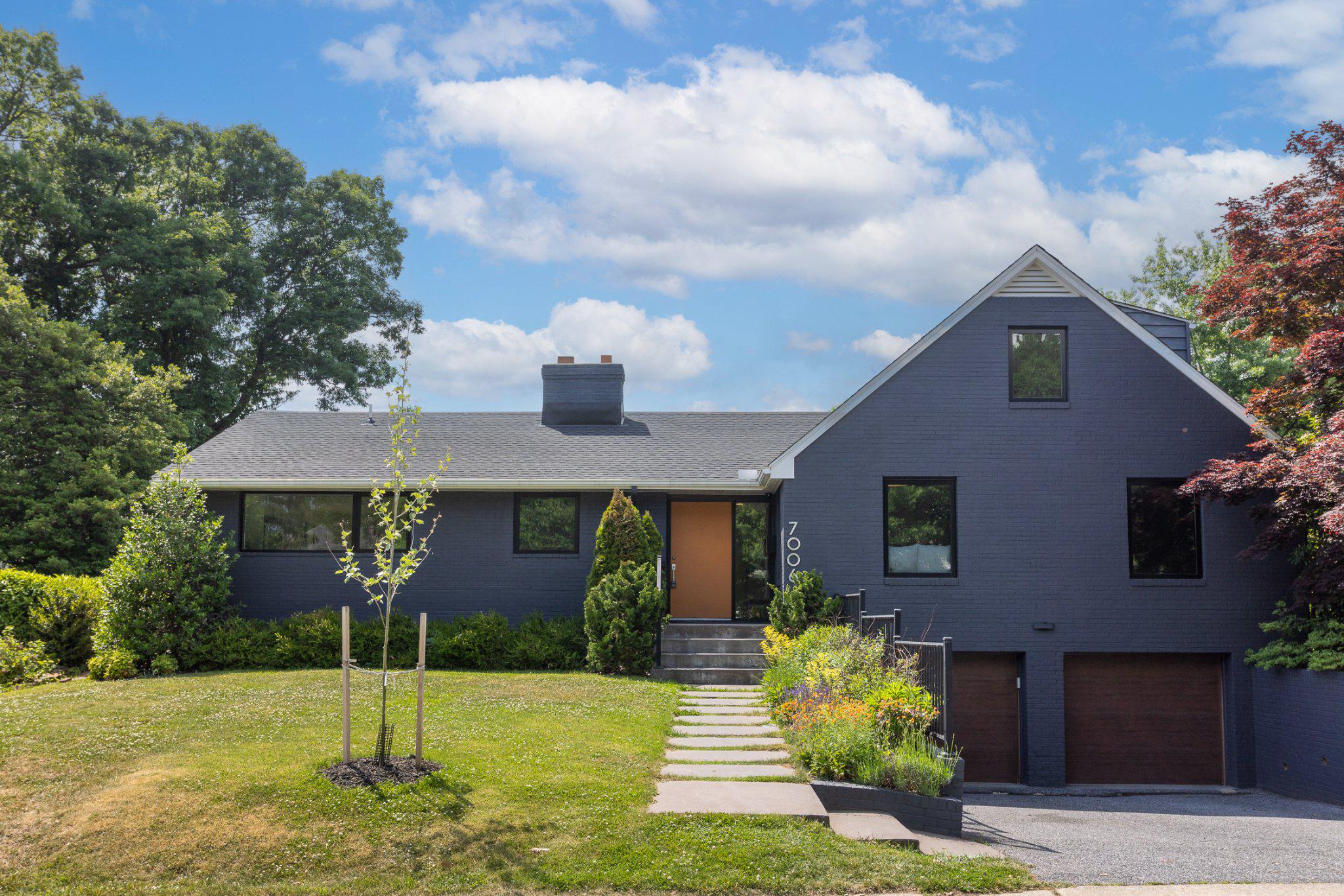 7006 Copeleigh Road Baltimore, MD 21212 - Photo 2 of 43 a front view of a house with garden