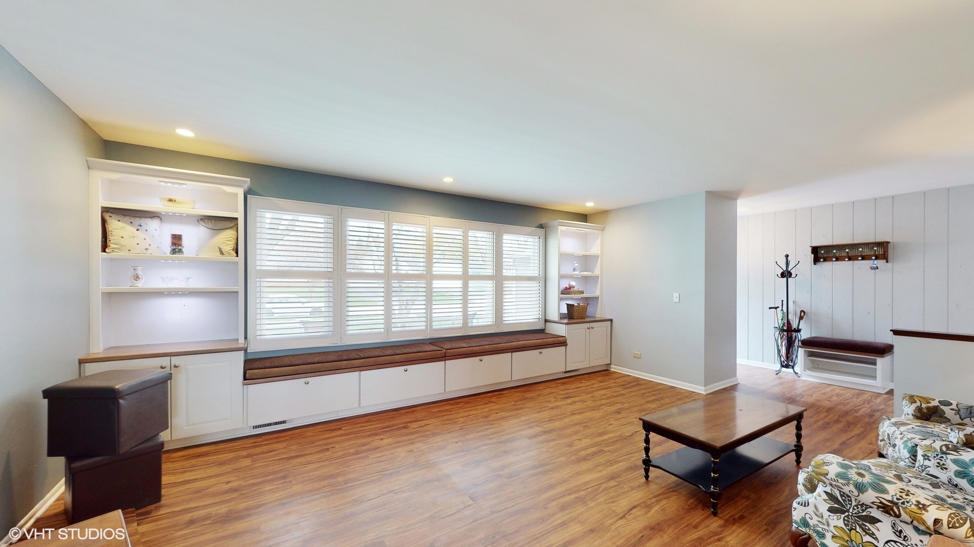 48 Lloyd Street Cary, IL 60013 - Photo 18 of 62 a living room with furniture and a window