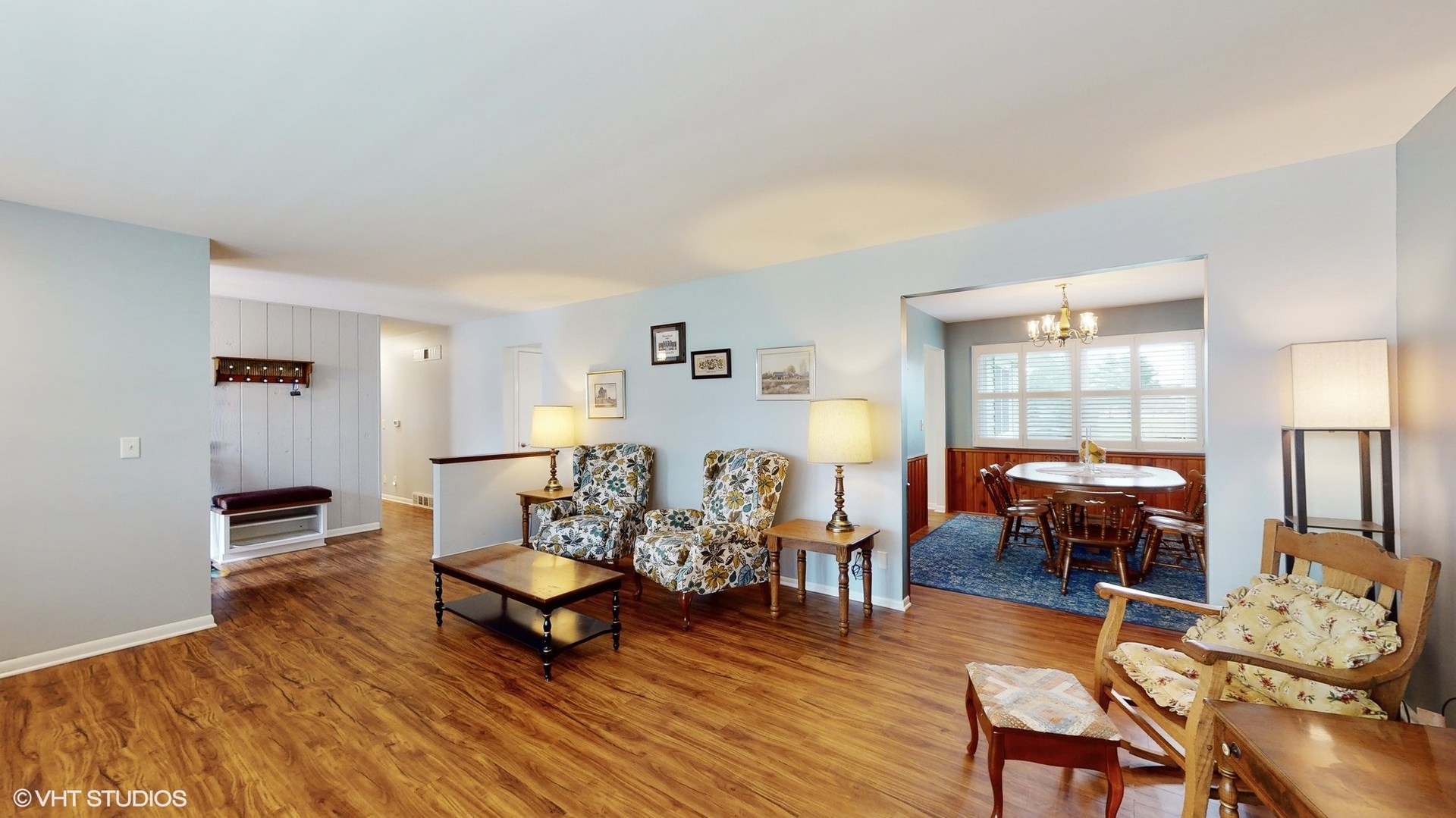 48 Lloyd Street Cary, IL 60013 - Photo 24 of 62 a living room with furniture and wooden floor