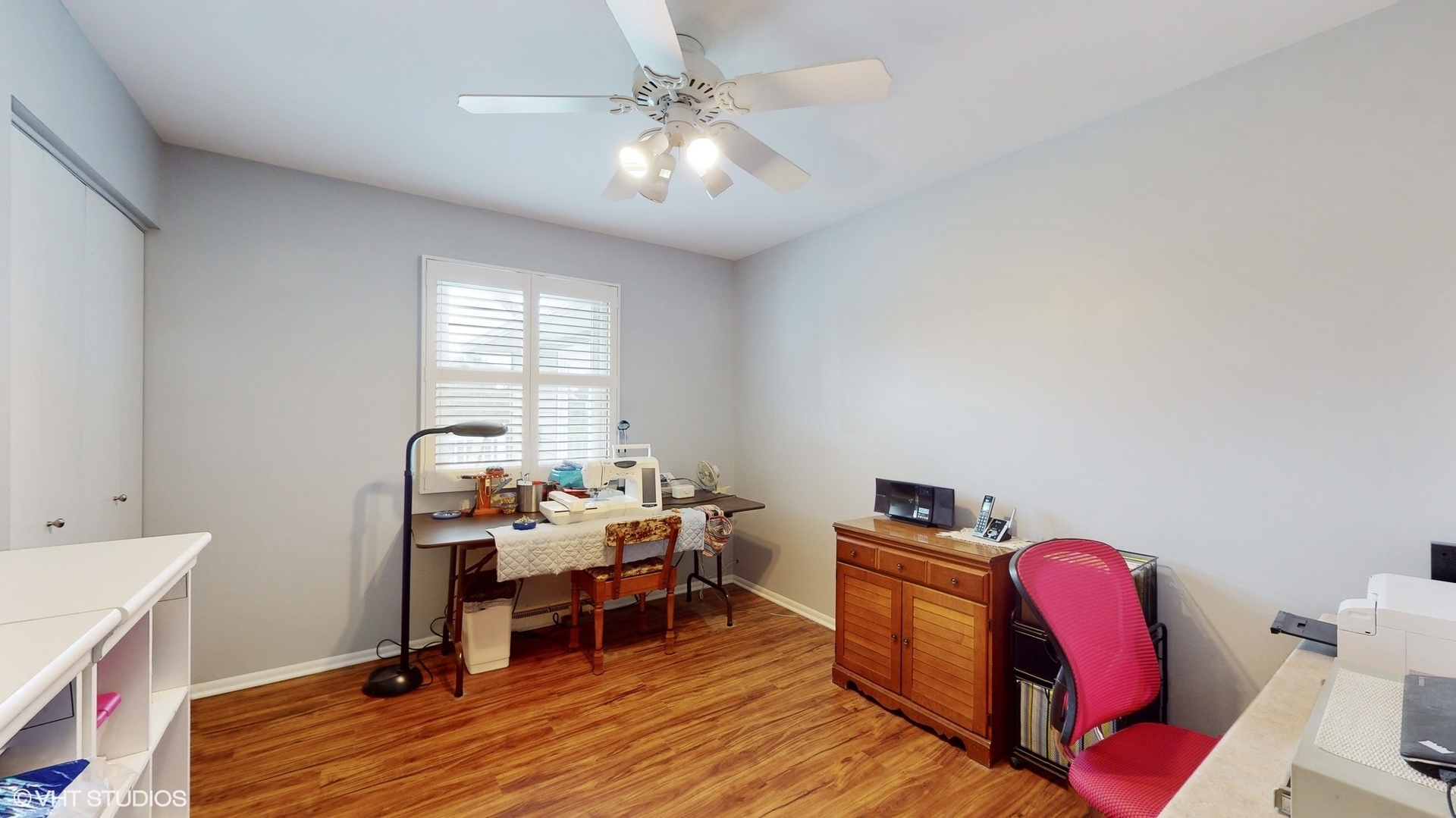 48 Lloyd Street Cary, IL 60013 - Photo 32 of 62 a bedroom with furniture and a wooden floor