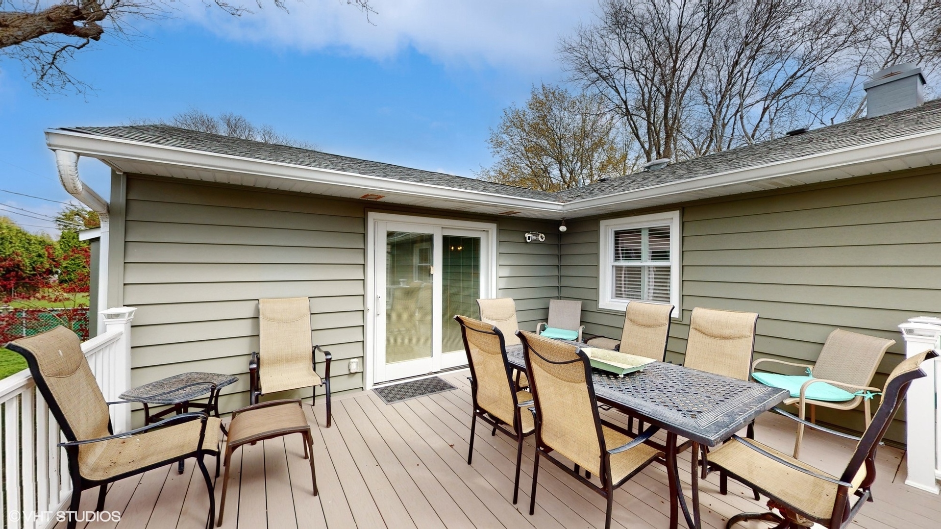 48 Lloyd Street Cary, IL 60013 - Photo 39 of 62 a view of a patio with table and chairs and potted plants