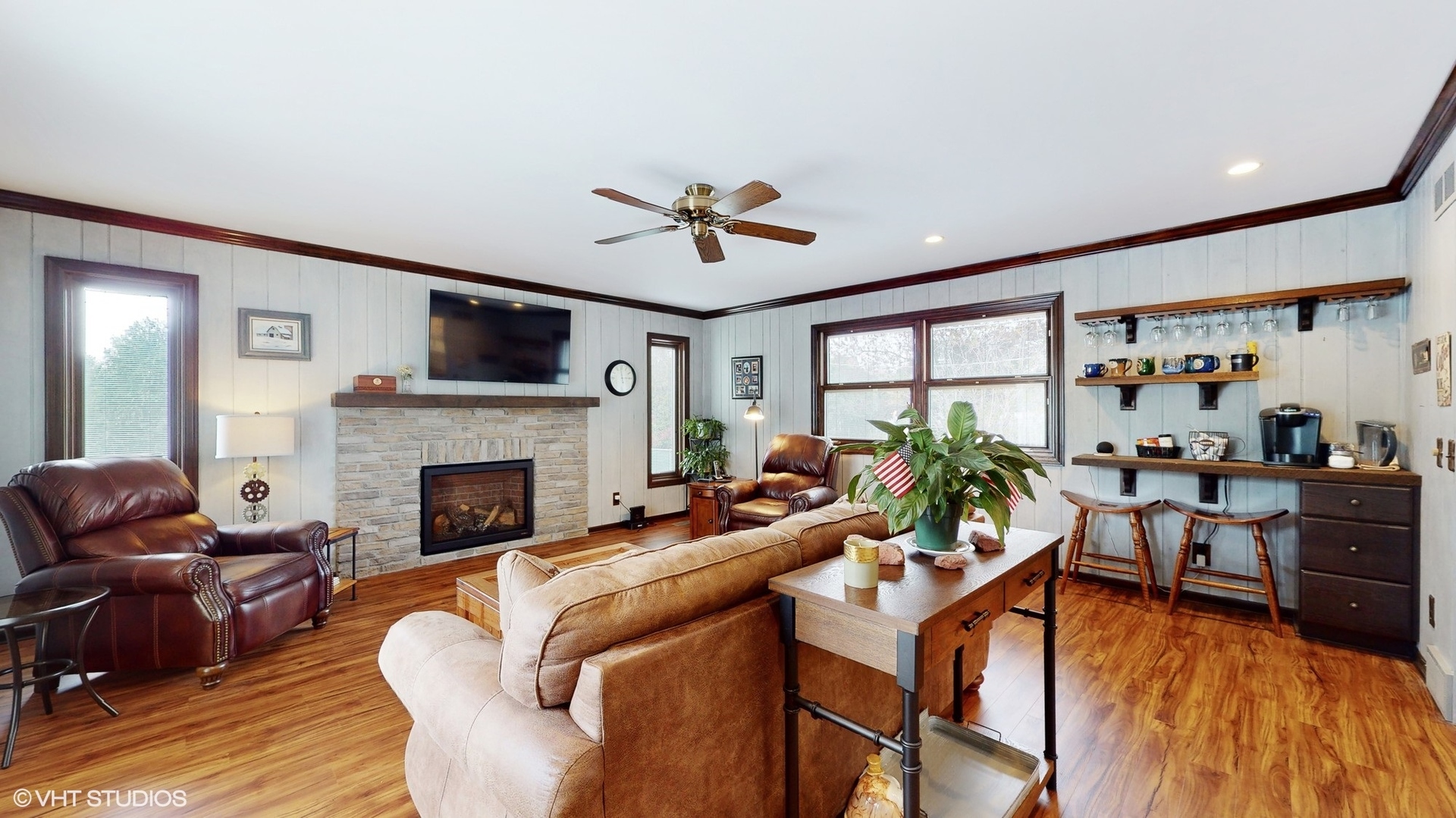 48 Lloyd Street Cary, IL 60013 - Photo 4 of 62 a living room with furniture fireplace and a flat screen tv