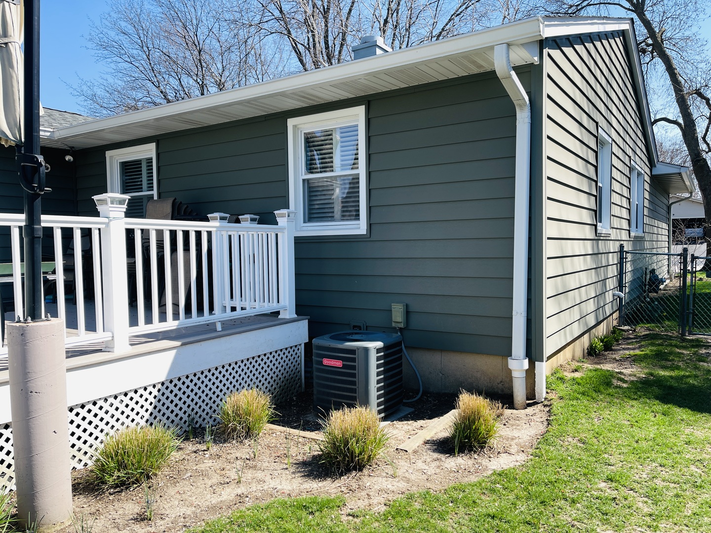 48 Lloyd Street Cary, IL 60013 - Photo 54 of 62 a backyard of a house with table and chairs