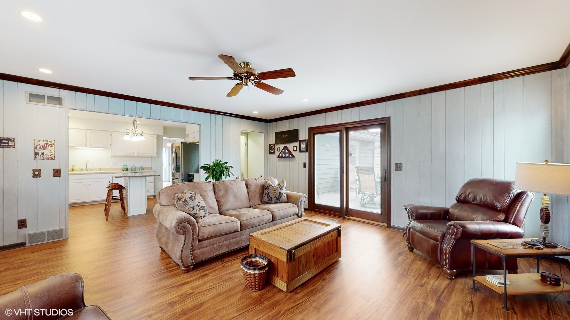 48 Lloyd Street Cary, IL 60013 - Photo 7 of 62 a living room with furniture and a large window