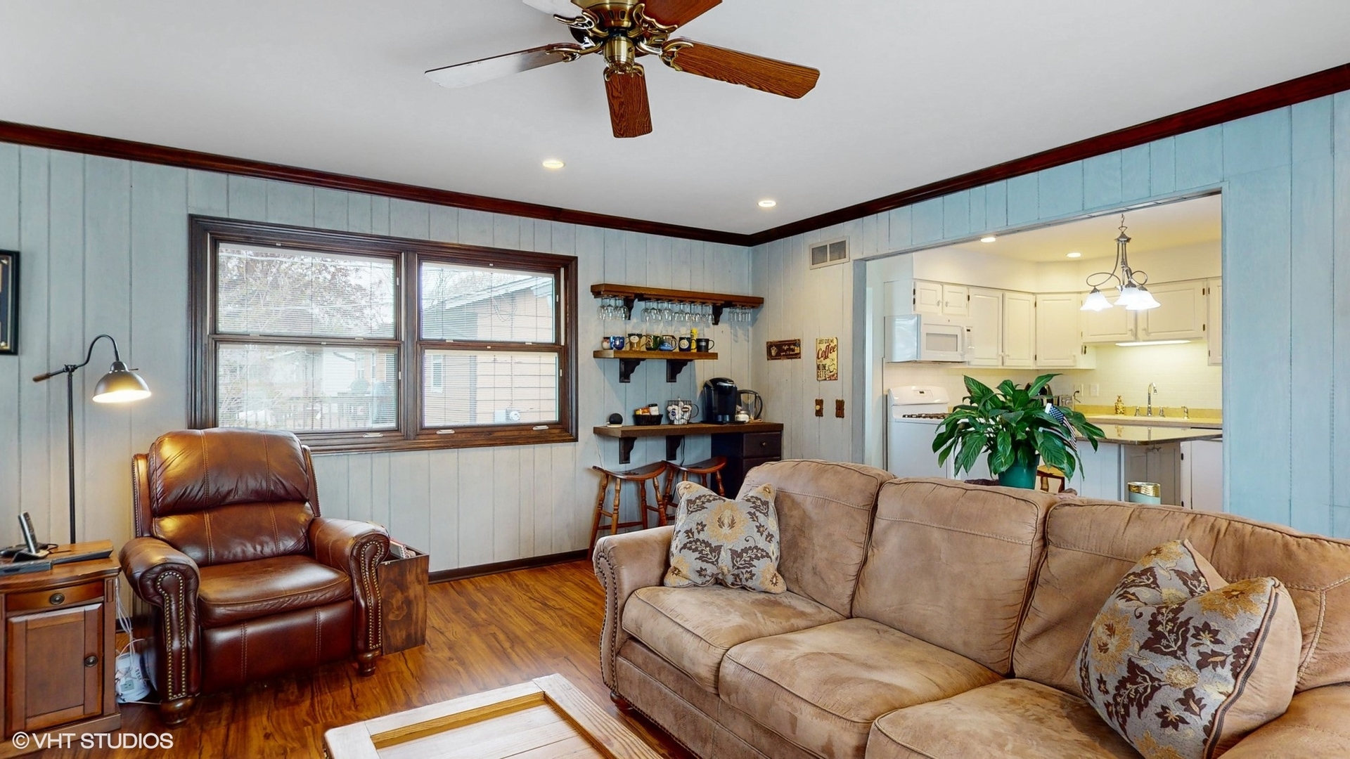48 Lloyd Street Cary, IL 60013 - Photo 8 of 62 a living room with furniture and a large window
