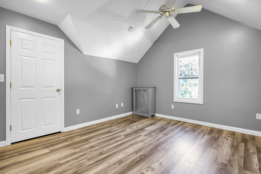 26 Gage Street Methuen, MA 01844 - Photo 21 of 29 a view of an empty room with wooden floor and a window