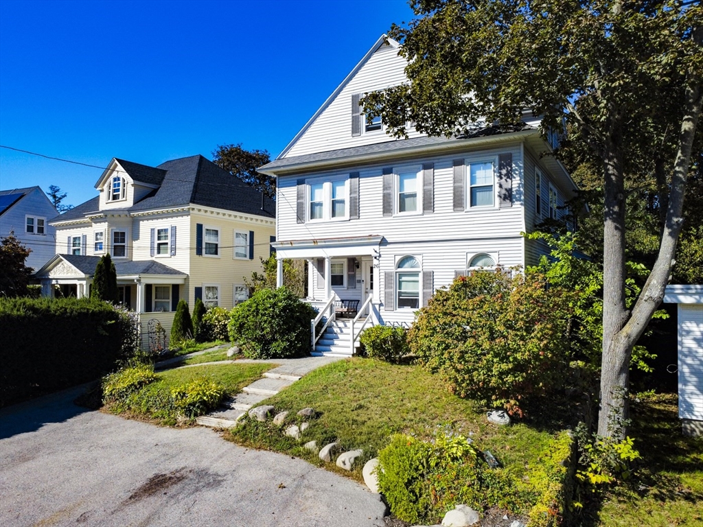 26 Gage Street Methuen, MA 01844 - Photo 3 of 29 a front view of a house with a yard
