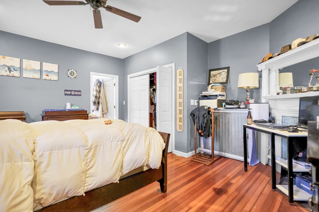 26 Gage Street Methuen, MA 01844 - Photo 7 of 29 a bed room with a bed and a desk