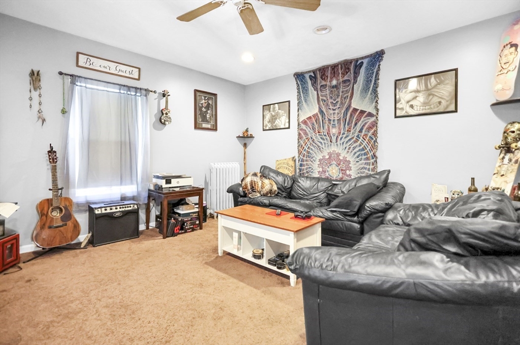 26 Gage Street Methuen, MA 01844 - Photo 10 of 29 a living room with furniture and a window