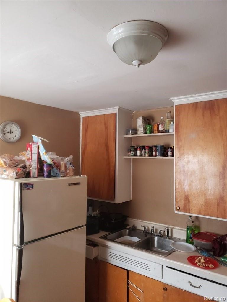 19110-06 Moross Road Detroit, MI 48224 - Photo 6 of 7 BOTH KITCHENS LOOK EXACTLY
