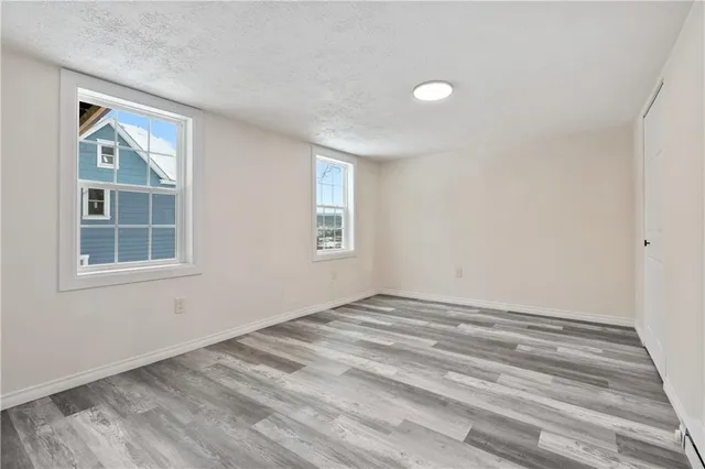 a view of empty room with windows