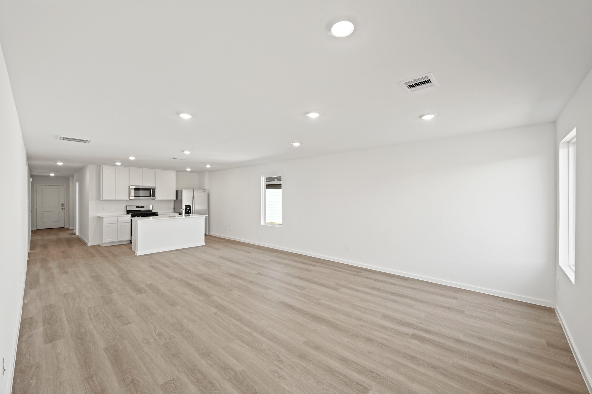 3032 Fall Gold Lane Katy, TX 77493 - Photo 7 of 24 a view of kitchen with wooden floor