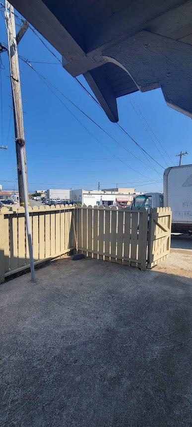 368 Roberts Avenue Seaside, CA 93955 - Photo 3 of 14 a view of an empty room with a wooden floor