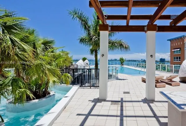 a view of balcony with a potted plant