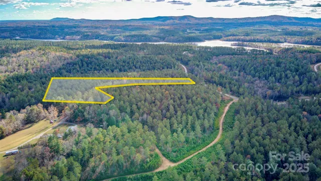 a view of a lake with a yard