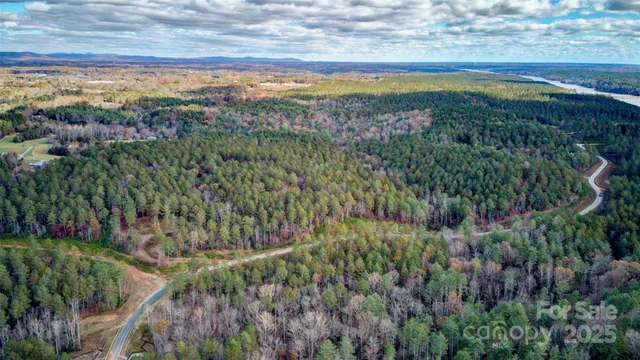 a view of a lake with a yard
