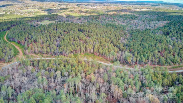 a view of a lake with a yard