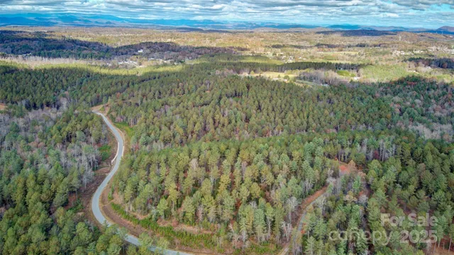 a view of a houses with a yard