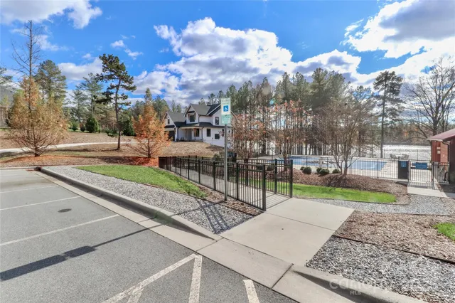 a aerial view of a house with garden space and sitting area