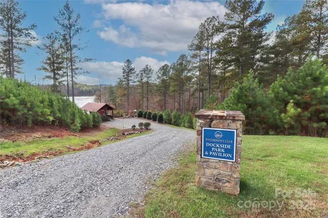an aerial view of a house with a yard and garden