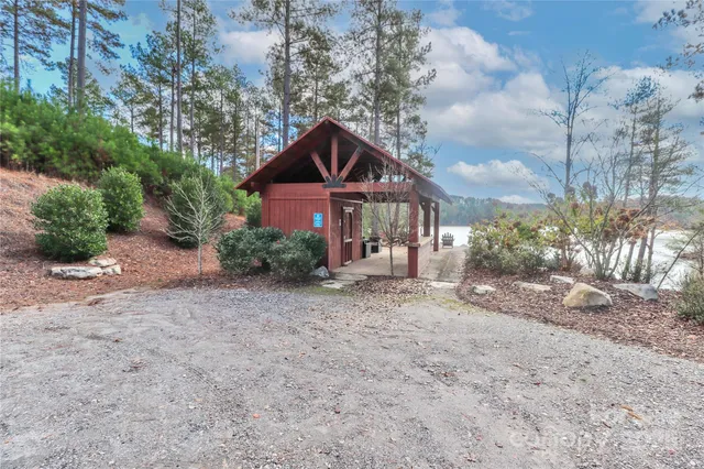 a patio with a patio table and chairs