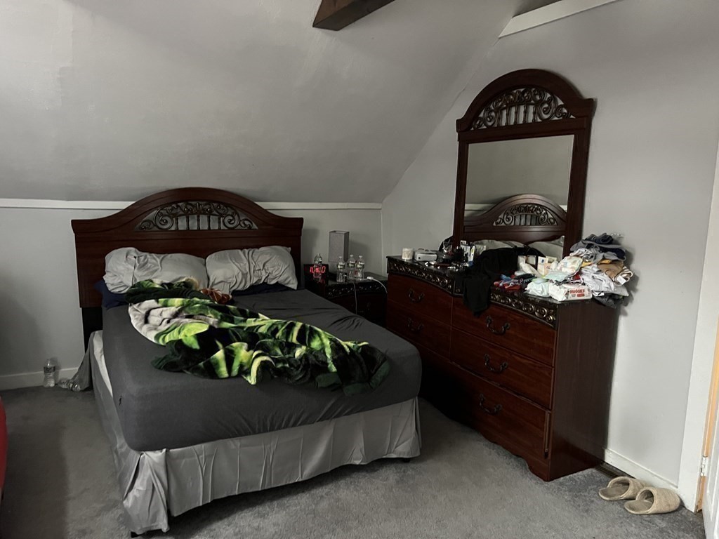 601 Main Street Bolton, MA 01740 - Photo 12 of 22 a bedroom with a bed and a dresser