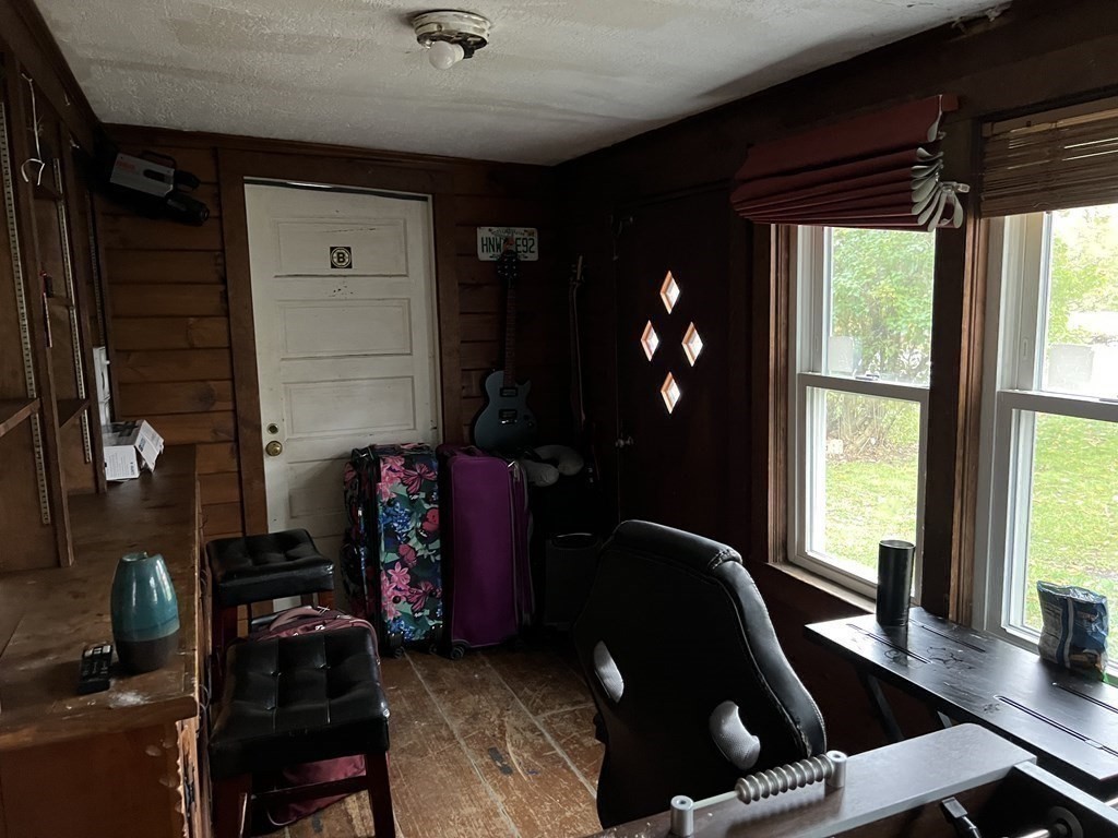 601 Main Street Bolton, MA 01740 - Photo 17 of 22 a room with furniture and window