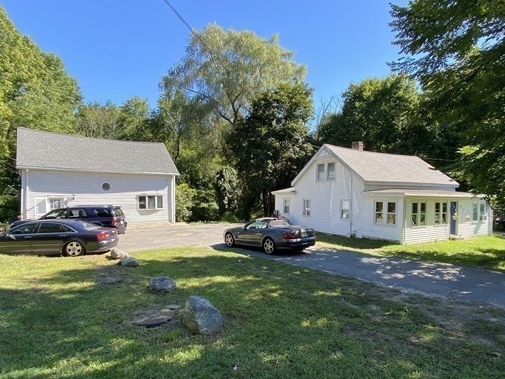 601 Main Street Bolton, MA 01740 - Photo 2 of 22 a view of a house with backyard and sitting area