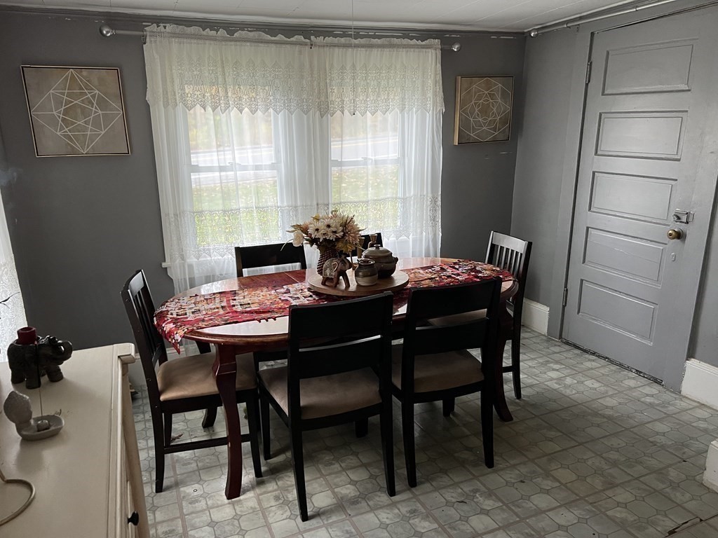 601 Main Street Bolton, MA 01740 - Photo 5 of 22 a dining room with furniture and window