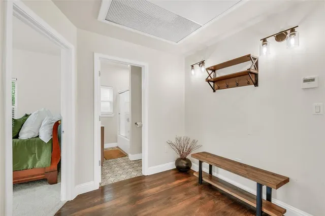 a bathroom with a bathtub and a sink