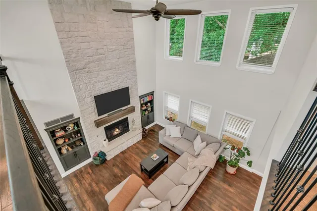 a bedroom with a bed a dresser and a window