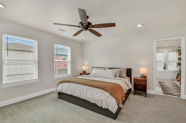 a bedroom with bed and window