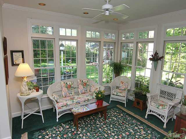 3412 Caldwell Drive Raleigh, NC 27607 - Photo 11 of 13 Enjoy the view of your lovely yard from the sunroom. Sun Room