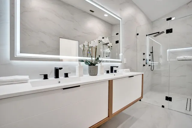 a view of a grassy field with trees