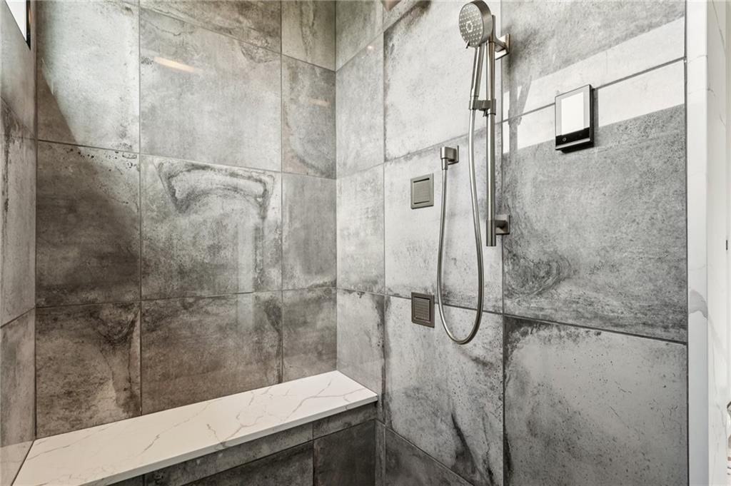 646 Science Street Pittsburgh, PA 15210 - Photo 22 of 35 The programmable porcelain shower is a true showstopper, featuring seven spray locations for a fully customizable experience.