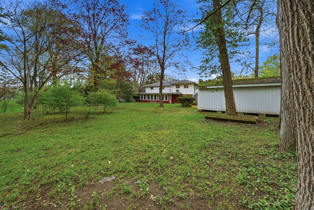 1 Ayrshire Road Worcester, MA 01604 - Photo 29 of 41 a view of a backyard with large trees