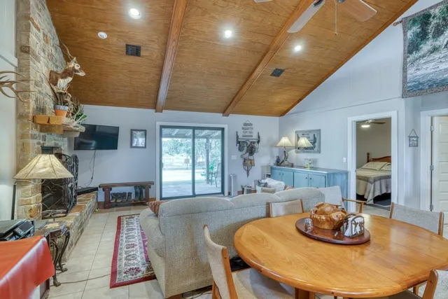 a bathroom with a toilet sink and shower