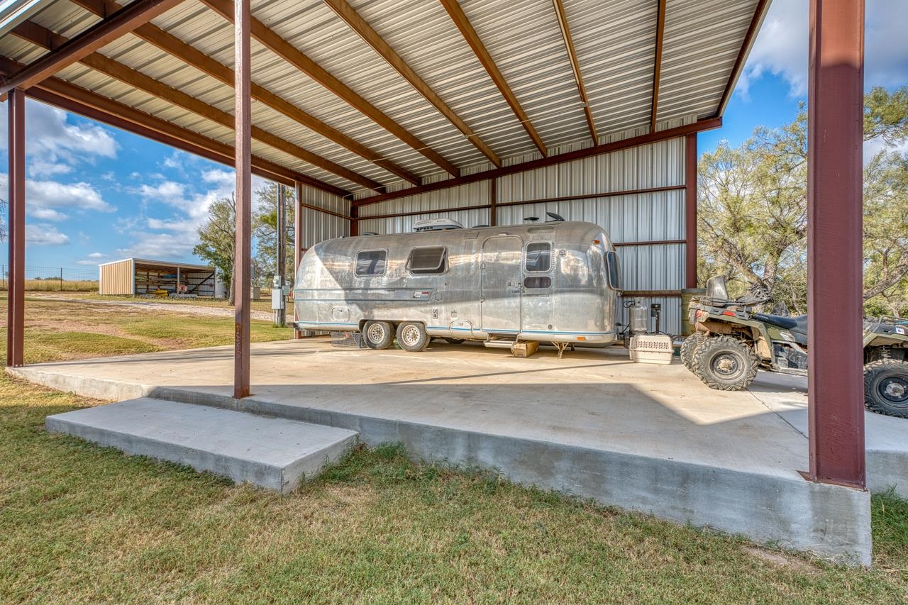 352 Keller Velino Road Mason, TX 76856 - Photo 16 of 25 a view of a porch with a table and chairs