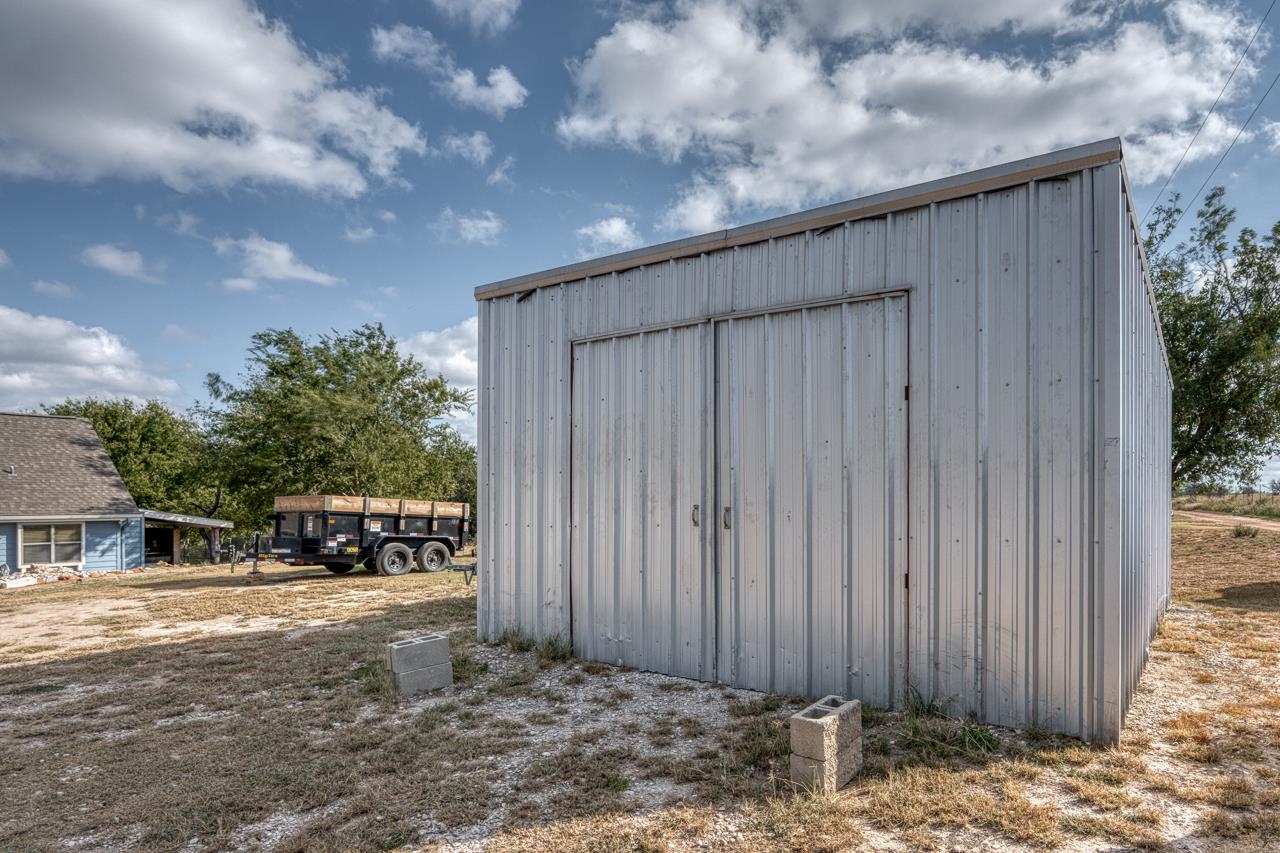 352 Keller Velino Road Mason, TX 76856 - Photo 18 of 25 a view of a house with backyard and sitting area
