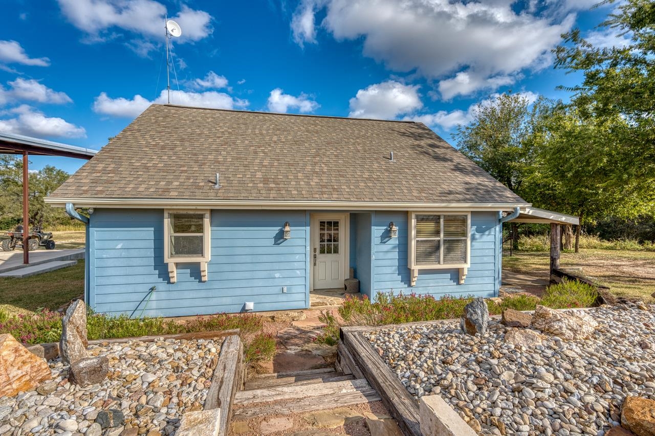 352 Keller Velino Road Mason, TX 76856 - Photo 19 of 25 a view of a house with wooden fence