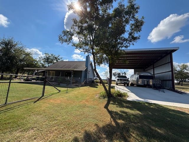 352 Keller Velino Road Mason, TX 76856 - Photo 20 of 25 a view of a swimming pool with a patio and a yard