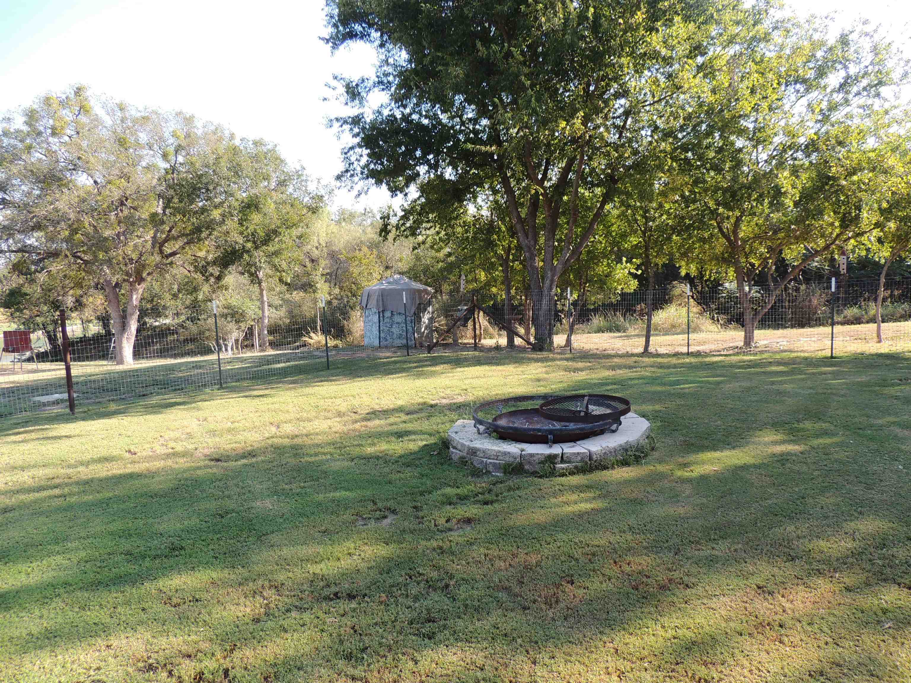 352 Keller Velino Road Mason, TX 76856 - Photo 21 of 25 a swimming pool with outdoor seating and yard