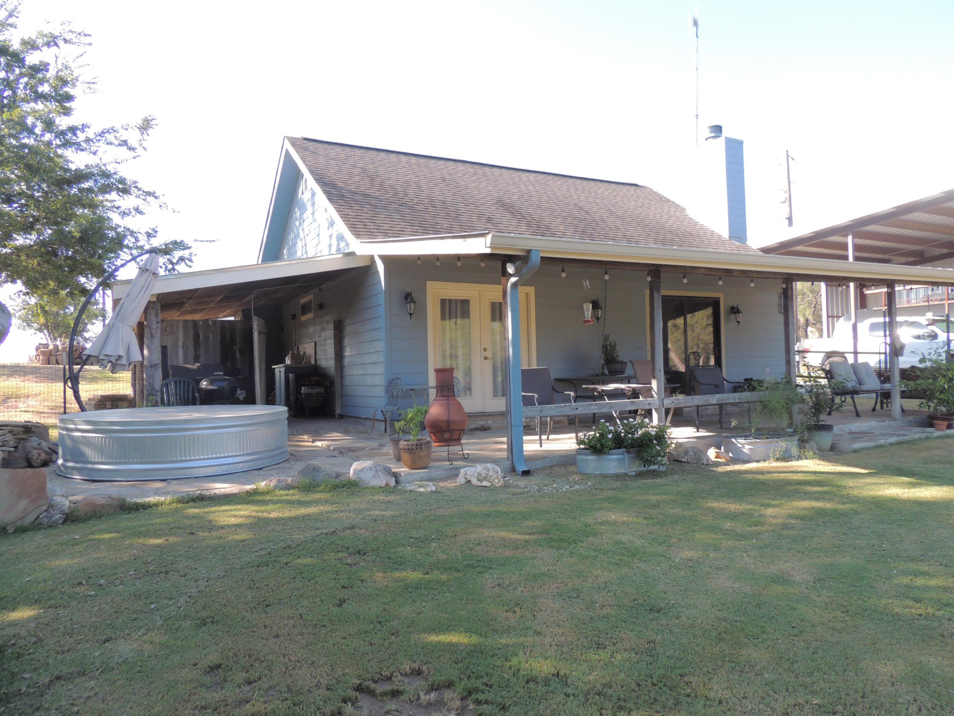 352 Keller Velino Road Mason, TX 76856 - Photo 23 of 25 a view of a house with backyard and sitting area