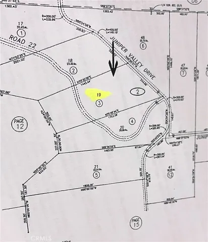 an aerial view of a house and a sign on the wall