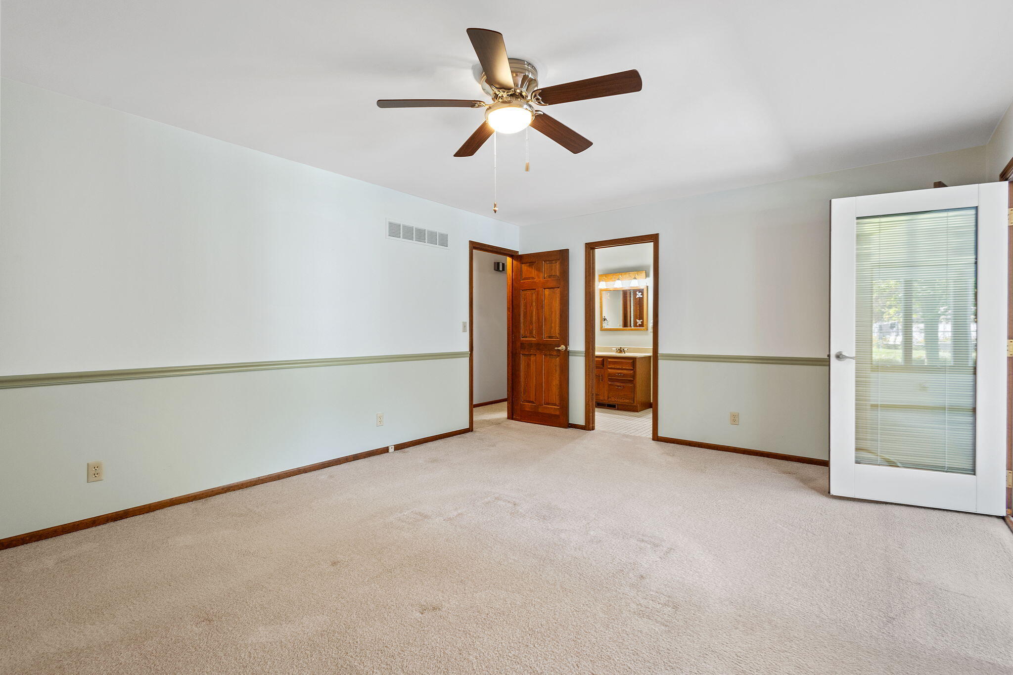 1905 Juniper Street Southwest De Motte, IN 46310 - Photo 23 of 42 an empty room with closet and windows