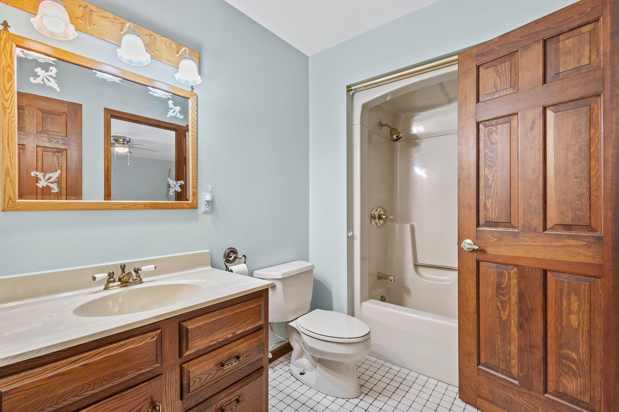1905 Juniper Street Southwest De Motte, IN 46310 - Photo 25 of 42 a bathroom with a granite countertop sink toilet and shower