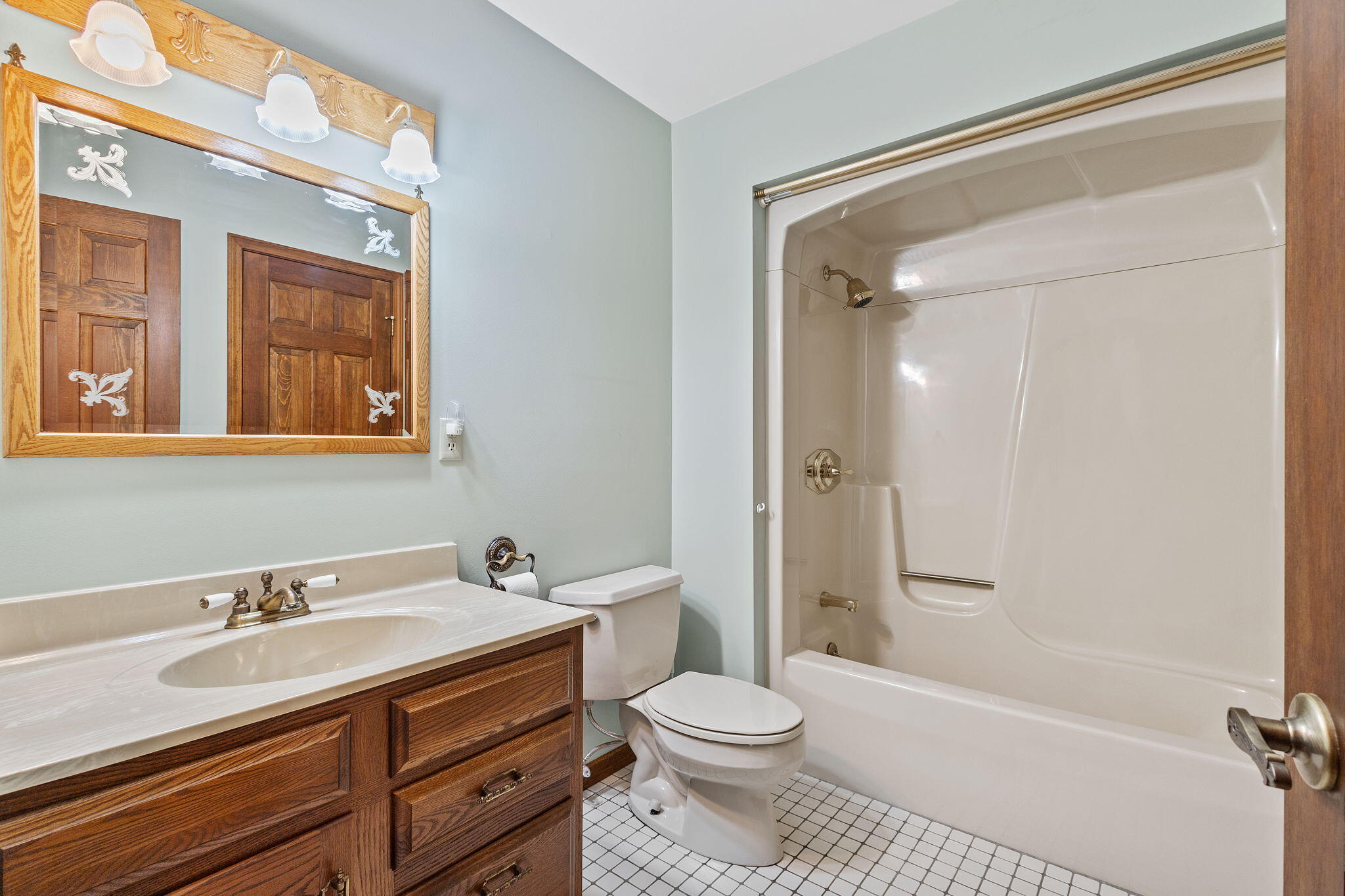1905 Juniper Street Southwest De Motte, IN 46310 - Photo 26 of 42 a bathroom with a granite countertop sink toilet and shower